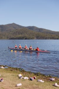 Rowers in rowing boat on Wyaralong Dam